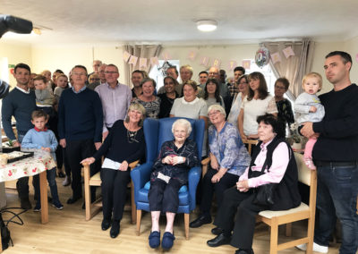 Lulworth House resident Betty on her 100th birthday surrounded by her family