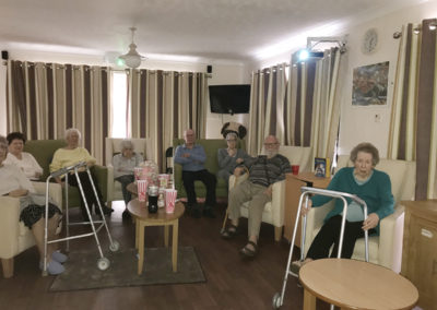 A group of Lulworth House residents enjoying a film night together
