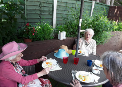 Lulworth House ladies having lunch outside