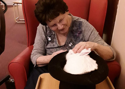 Lulworth house residents loved stroking the rabbit that Marco the Magician conjured from a hat