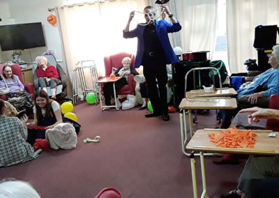 Marco the Magician entertaining Lulworth house residents with rope tricks