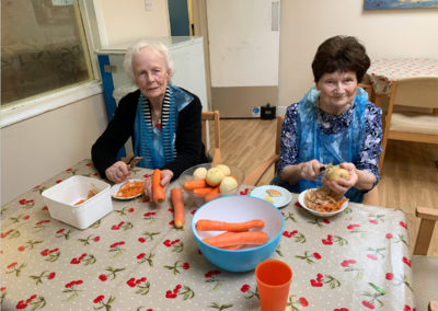 Lulworth House Residential Care Home residents preparing vegetable soup