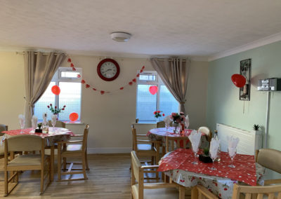 Lulworth House Residential Care Home dining room decorated for Valentines Day