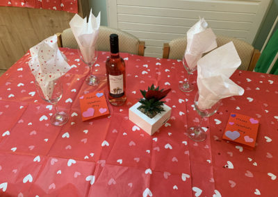 Lulworth House Residential Care Home dining room tables decorated for Valentines Day