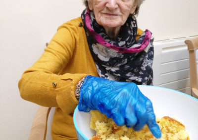 Lulworth lady in a baking session with a bowl of sponge