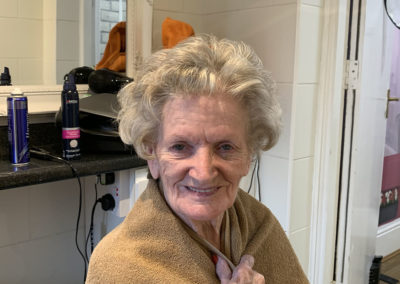 Lulworth House resident showing off her new hairdo