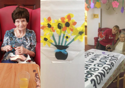 Lulworth House Residential Care Home residents cutting out paper stars, making a sign and a tissue paper daffodil