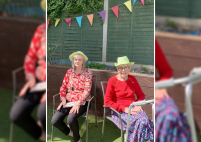Lulworth House Residential Care Home residents outside in the sun in their garden