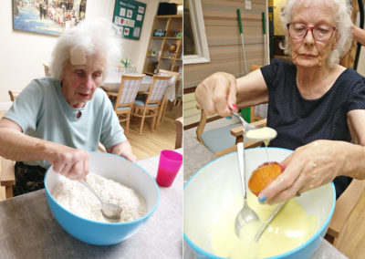 Lulworth House residents making muffins together