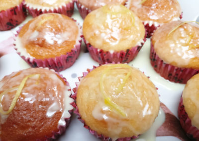 A tray of lemon drizzled muffins