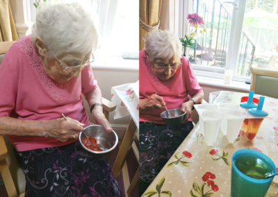 Lulworth House Residential Care Home resident making fruit jelly lollies