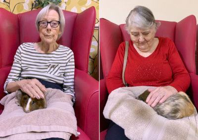 Lulworth House Residential Care Home resident with the Home's Guinea pig