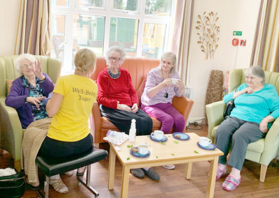 Lulworth House Residential Care Home residents enjoying a Namaste session together