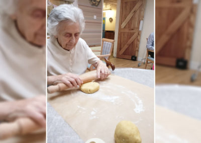 Lulworth House Residential Care Home resident rolling our cookie dough