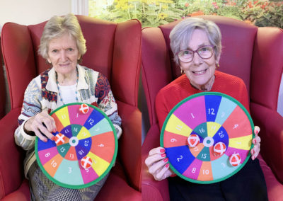 Lulworth House Residential Care Home residents with a colourful dartboard