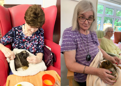 Lulworth House Residential Care Home residents with their pet Guinea pigs
