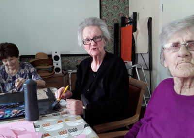Lulworth House Residential Care Home residents making party decorations 2