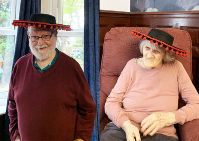 Lulworth House Residential Care Home lady and gent wearing Spanish hats