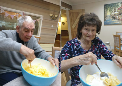 Residents mixing biscuit ingredients at Lulworth House Residential Care Home