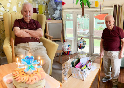 Resident with his birthday gifts and presents at at Lulworth House Residential Care Home
