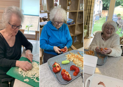 Lady residents at Lulworth House preparing vegetables to make soup