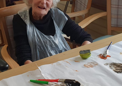 Resident Halloween painting at Lulworth House Residential Care Home