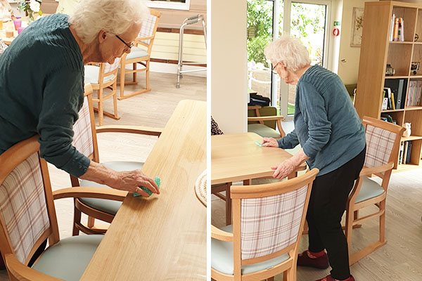 Lulworth House Residential Care Home cleaning down lounge tables