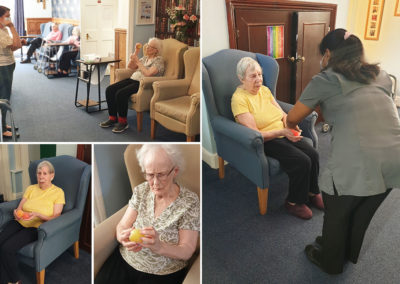 Trying out stress balls at Lulworth House Residential Care Home