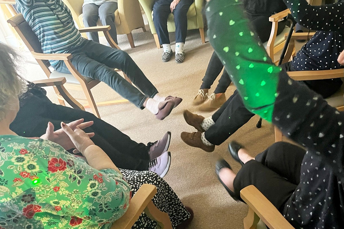 Group yoga session at Lulworth House Residential Care Home